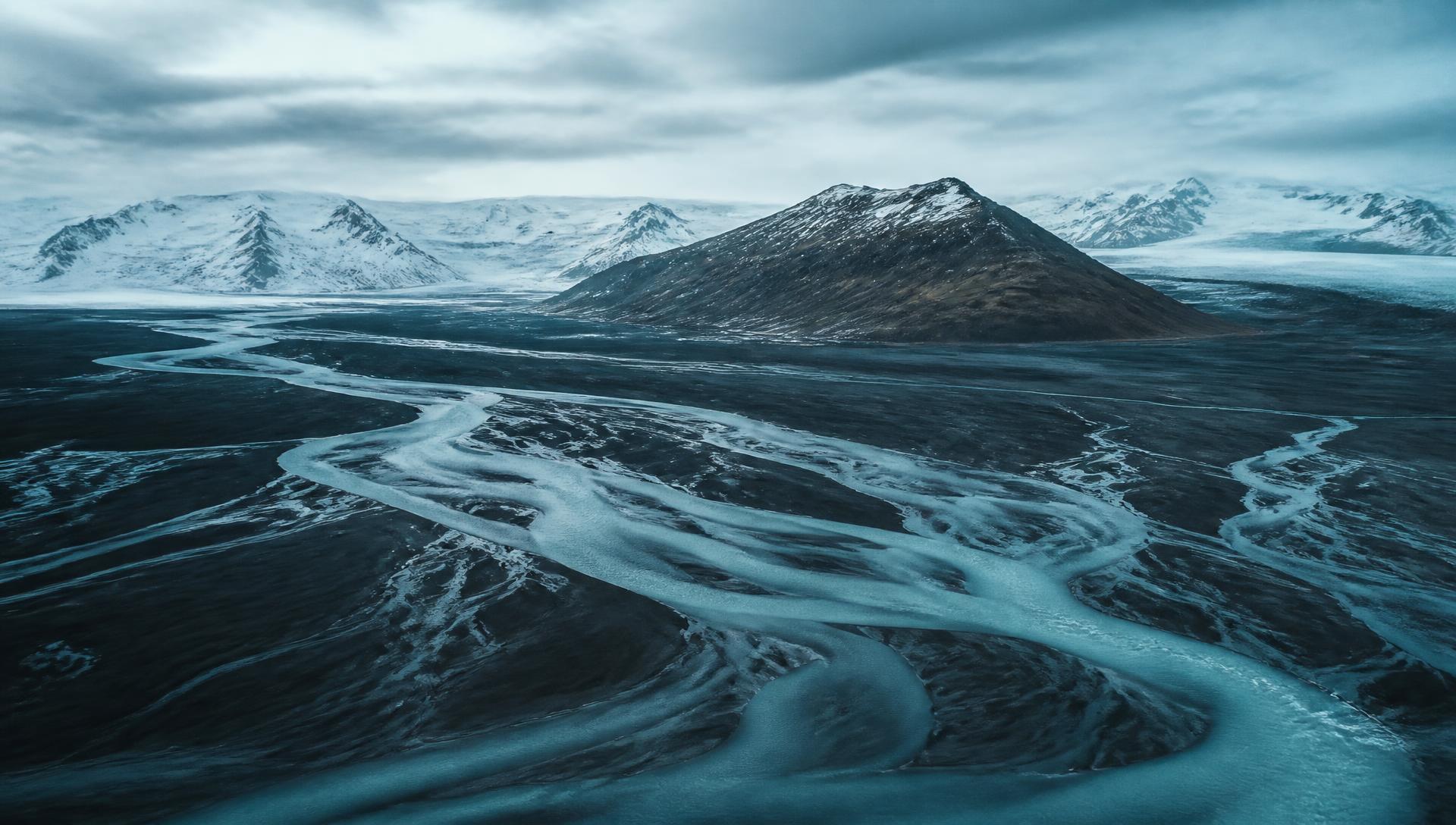 Cold Icelandic river country under low light